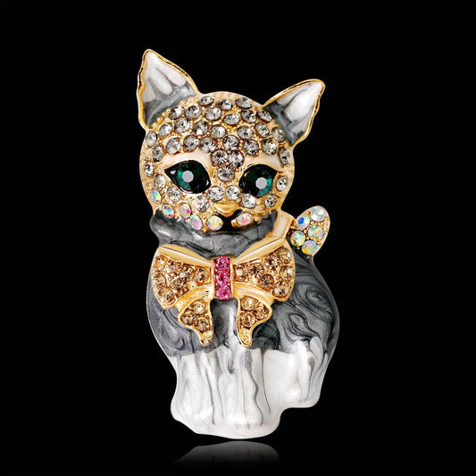 Green-eyed kitten enamel brooch