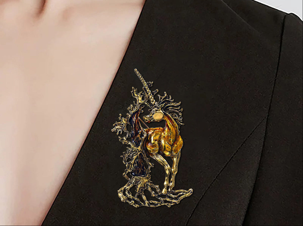 Vintage gold unicorn brooch pin with elegant metallic finish