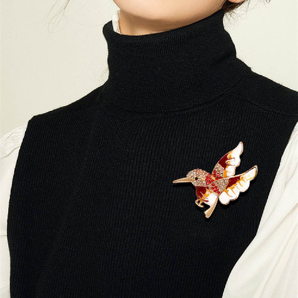 Colorful hummingbird enamel brooch