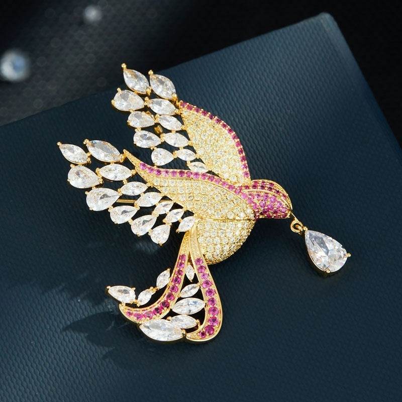 Crystal bird brooch with zircon stones