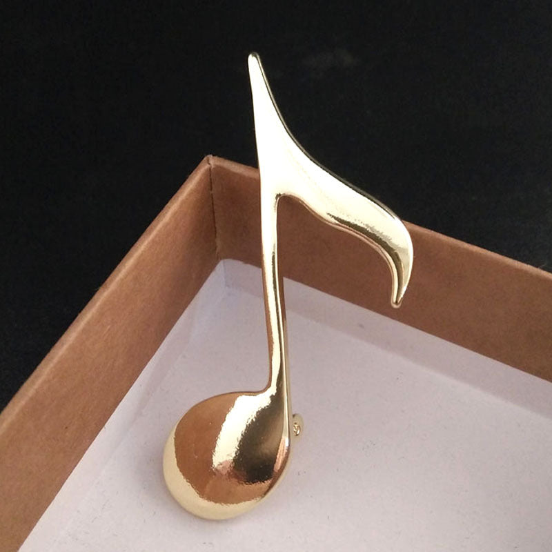 Elegant musical note brooch pin