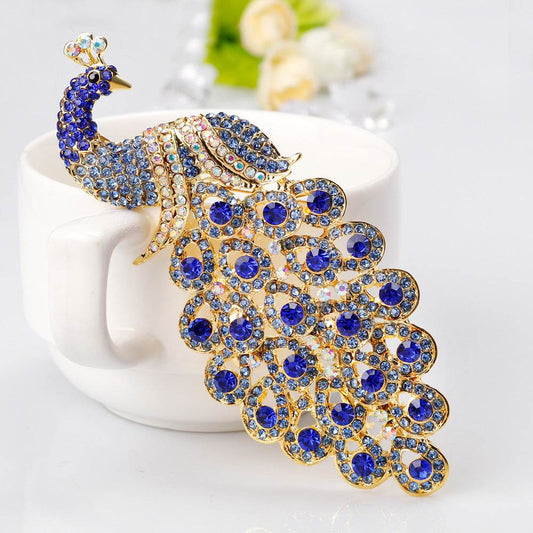 Large sapphire peacock crystal brooch