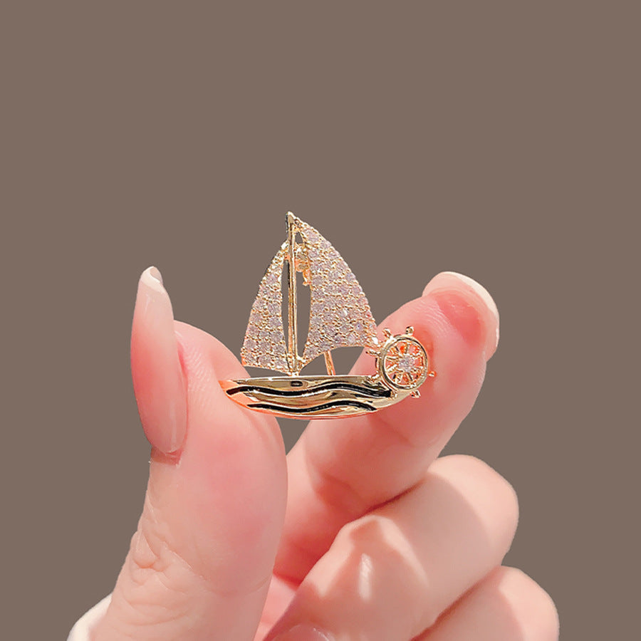 Sailboat brooch pin