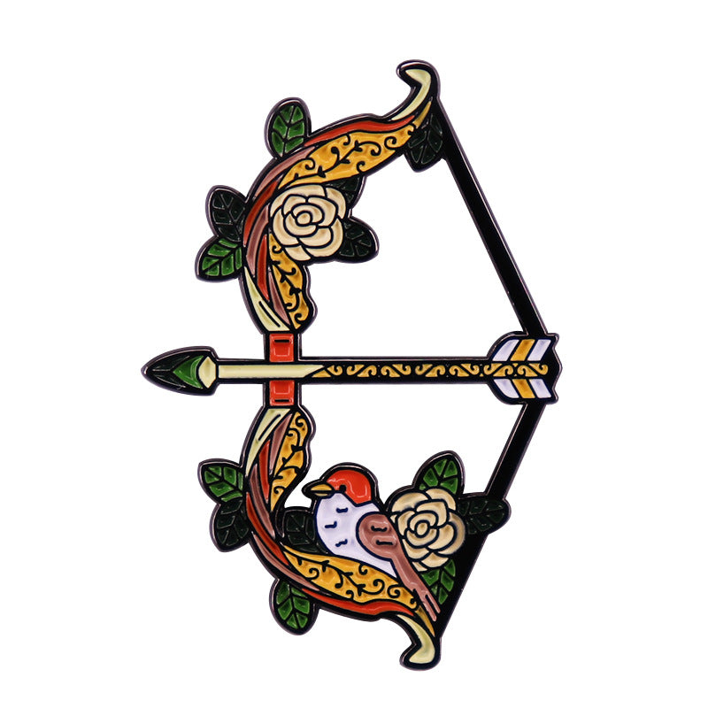 Sparrow bird brooch with arrow design
